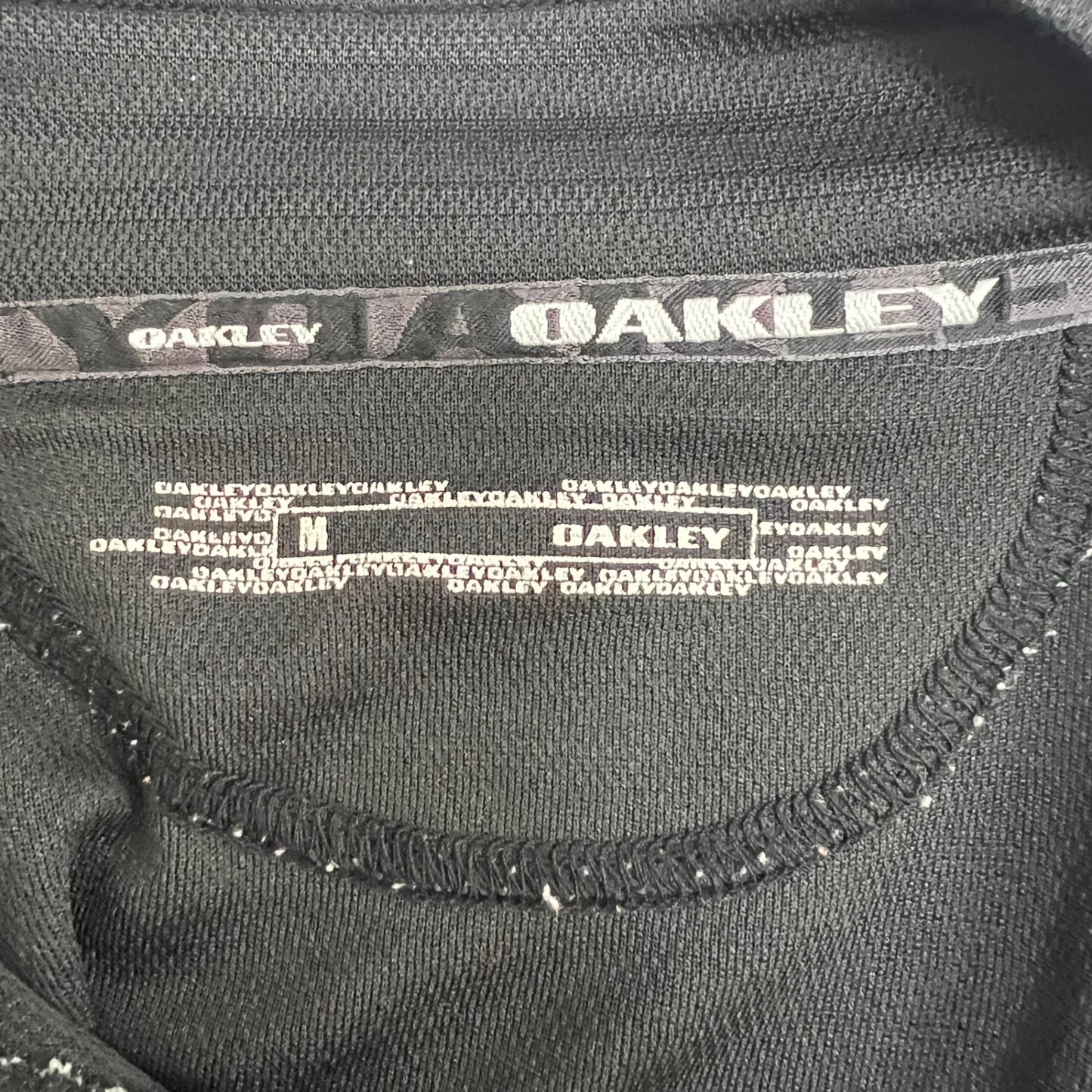オークリー　ゴルフウェア　半袖ポロシャツ　M　ブラック　黒　ハーフジップ　メンズアパレル　OAKLEY
