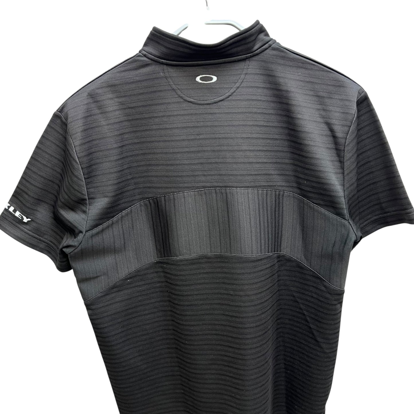 オークリー　ゴルフウェア　半袖ポロシャツ　M　ブラック　黒　ハーフジップ　メンズアパレル　OAKLEY