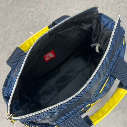 ARCHIVIO　アルチビオ　ゴルフラウンドバッグ　カートバッグ　aロゴワッペン　イエロースター総柄　ネイビーカラーベース　小物入れ